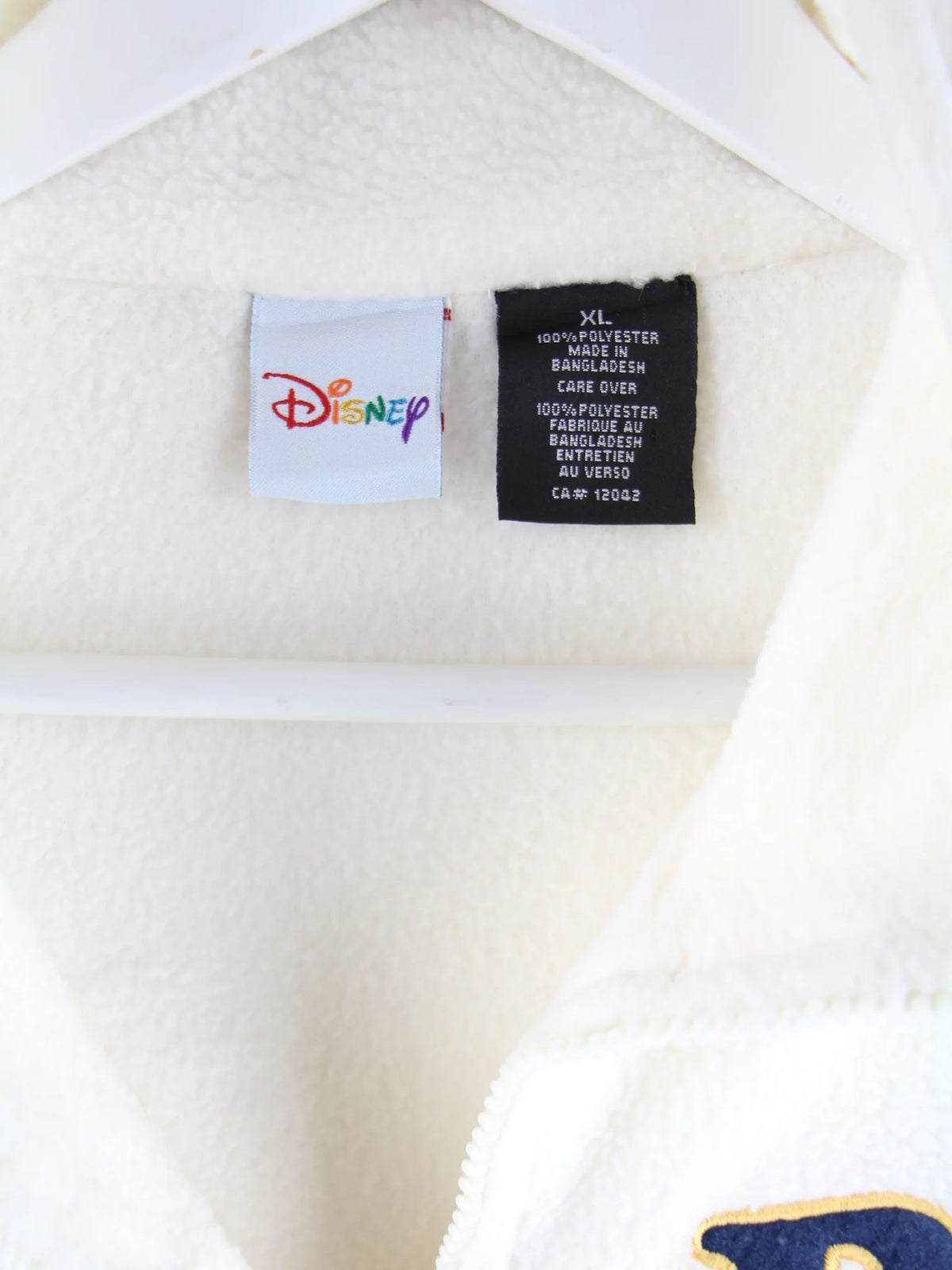Pooh Fleece Weiß XL – Etikett