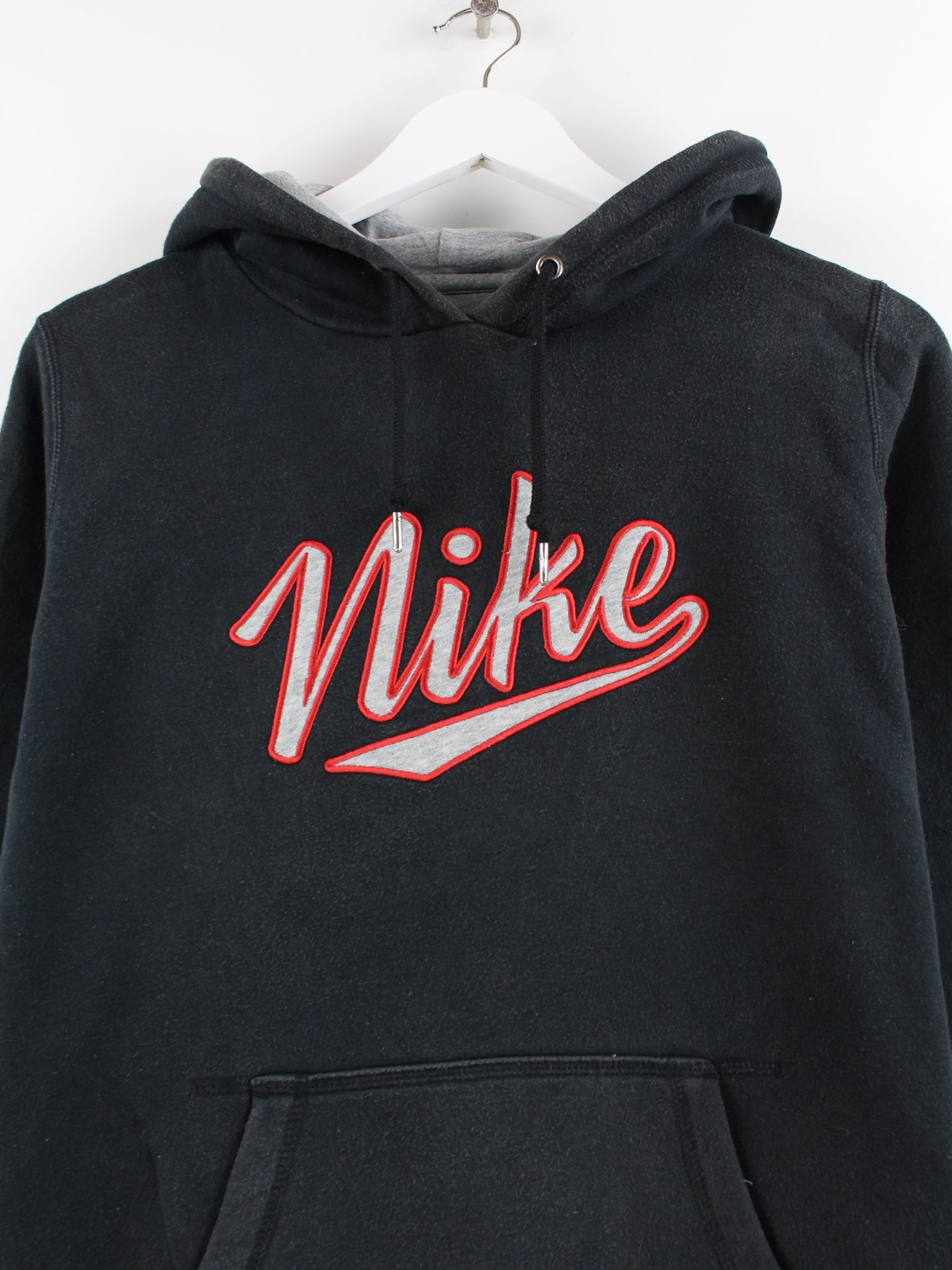 black nike hoodie with red logo