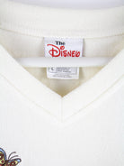 Disney Fleece Beige L – Etikett
