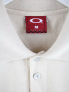 Oakley Polo Beige M – Etikett